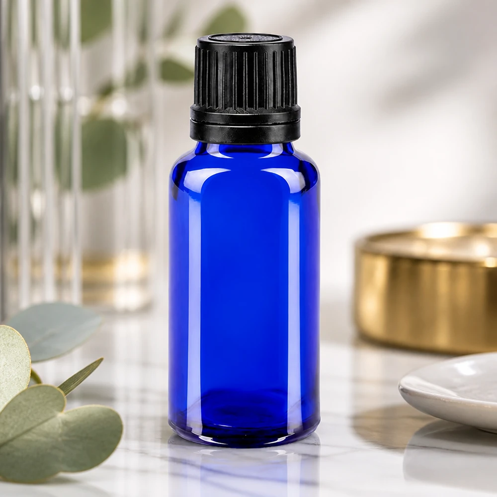 Blauwe apothekersfles van 20 ml met precisiedruppelaar voor etherische oliën en farmaceutische producten