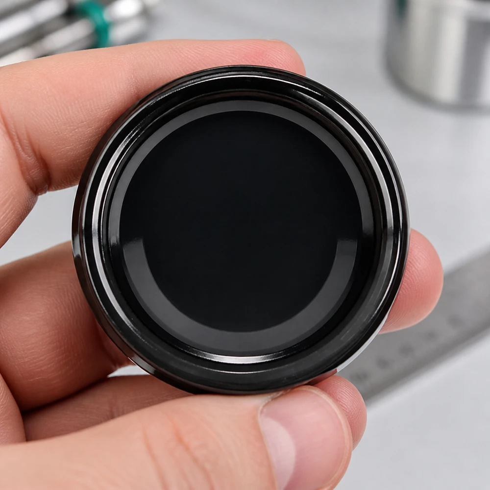 UNiTWIST TO63 BPA-NI draaidop zwart unitemp metalen rand detailbeeld van bovenaf