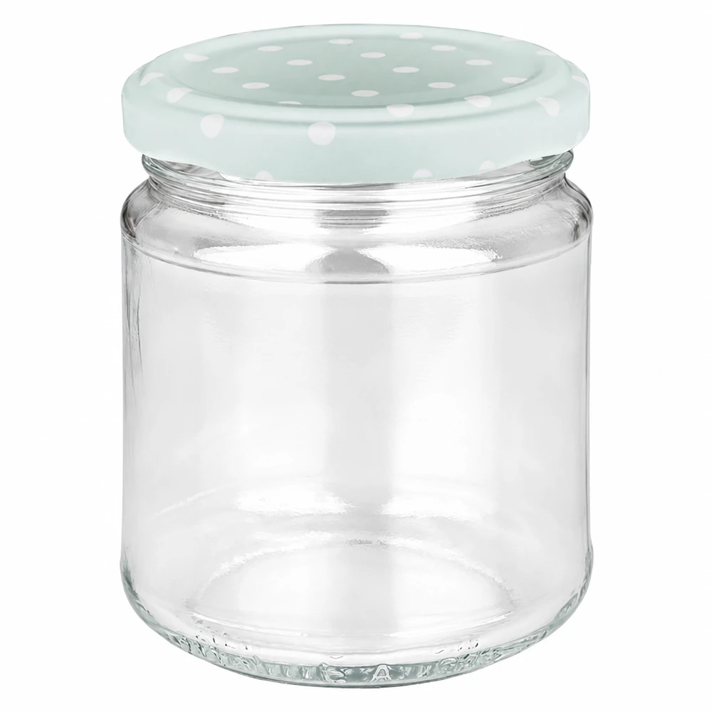 Ronde pot 212 ml + deksel BasicSeal mint stippen UNiTWIST 212ml ronde pot met mintgroene BasicSeal deksel en witte stippen, lege jampot op een witte achtergrond