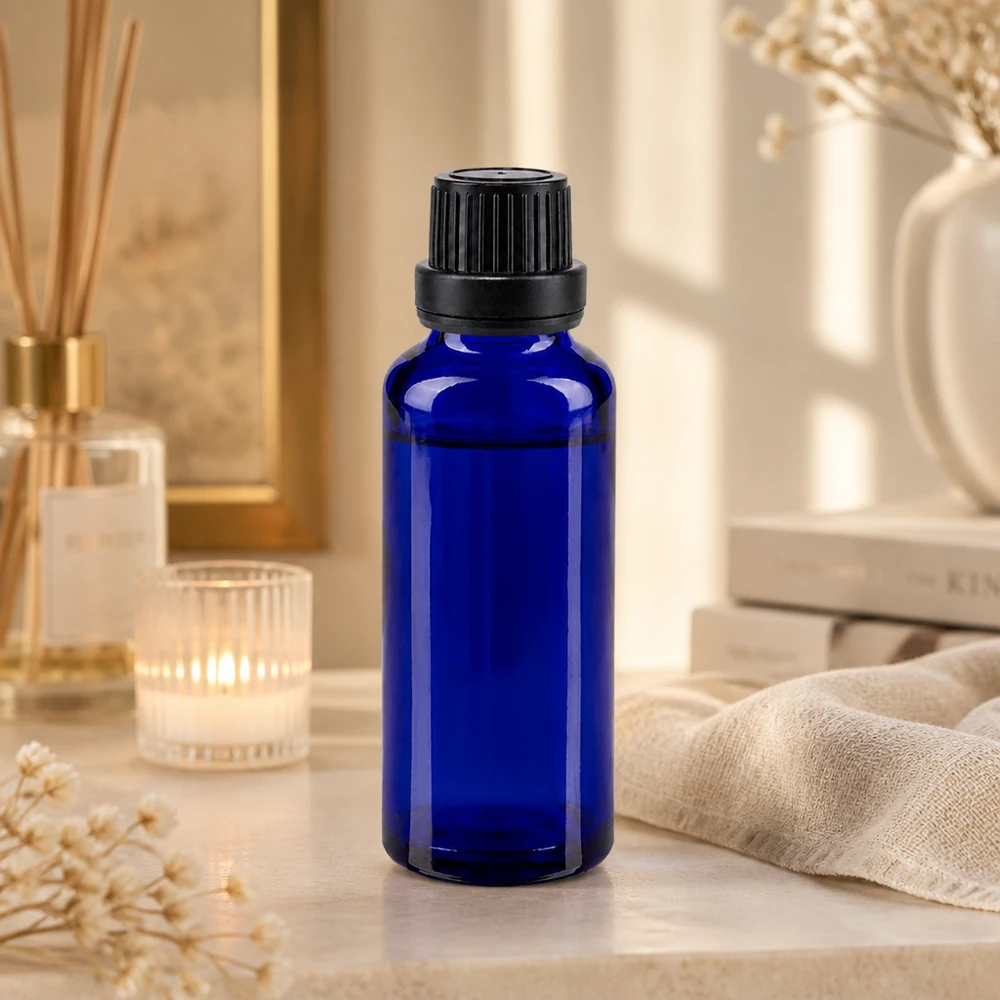 Donkerblauwe glazen druppelfles van 30 ml met zwarte dop voor gevoelige werkzame stoffen