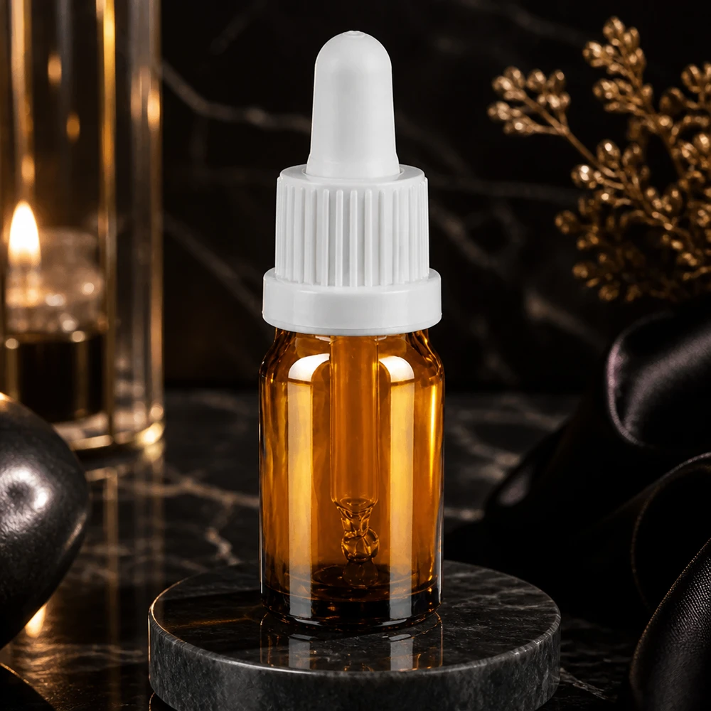 Klein pipetflesje van 5 ml in elegant bruin glas met praktische druppeldop