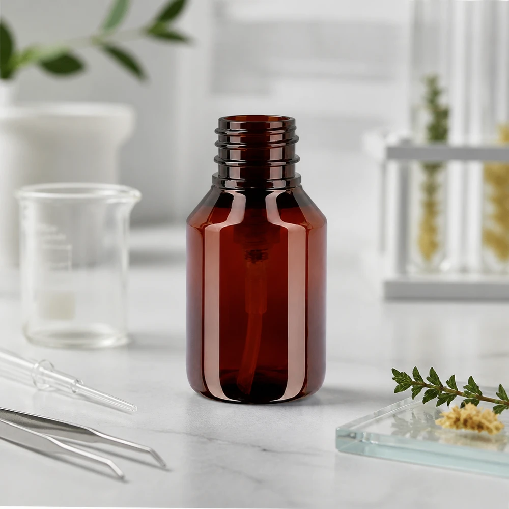 PET-fles 50ml met dispenserpomp zwart Ronde fles van 50 ml van lichtgewicht PET-kunststof in amberkleur voor serums en verzorgingsoliën