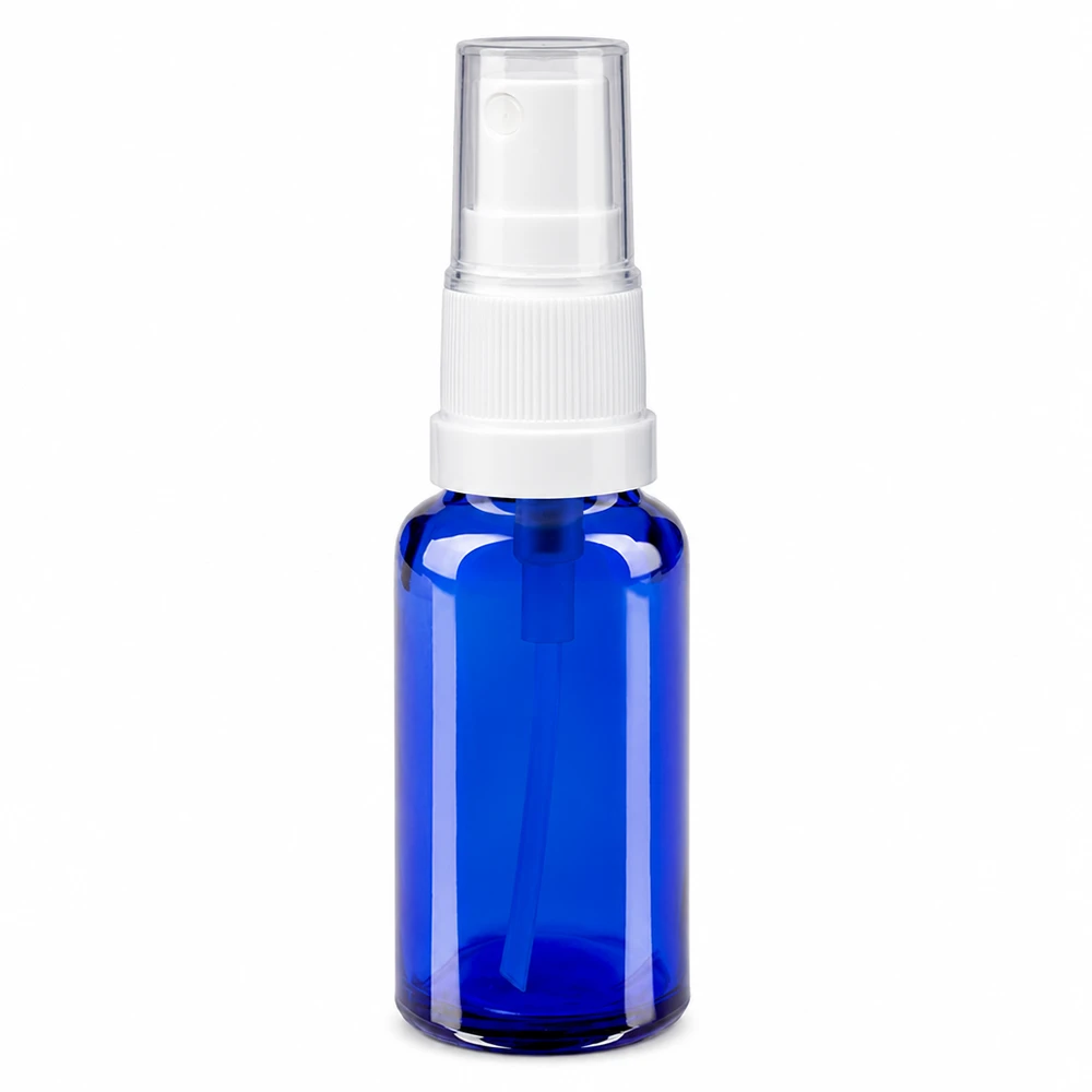 Compacte kobaltblauwe glazen fles van 20 ml met een witte pompspuit voor etherische oliën