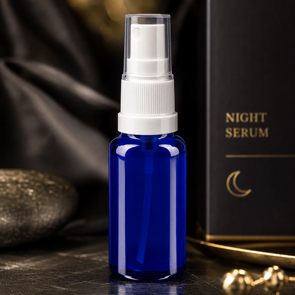 Sprayflesje van 20 ml van blauw veiligheidsglas met een STD-pompje in wit voor gezichtsserum en verzorgingsoliën