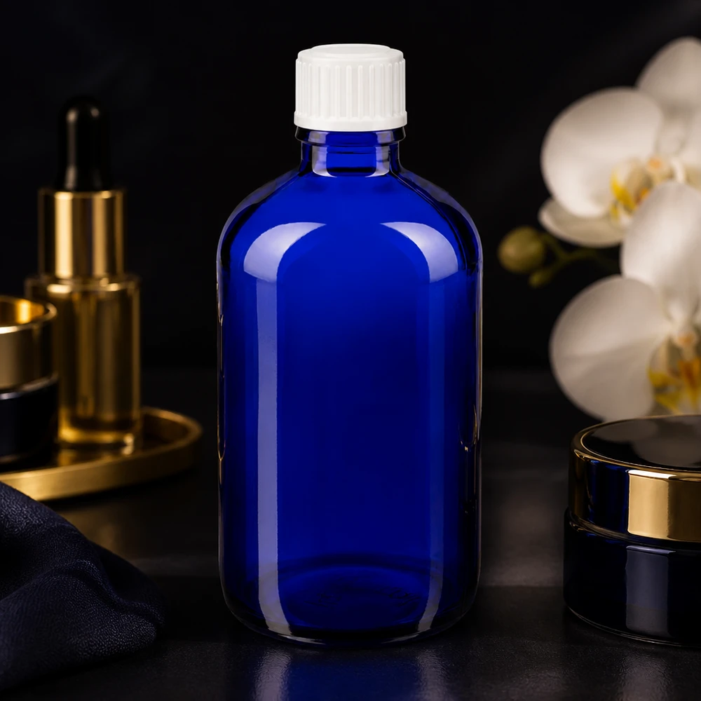 Blauwe glazen fles met UV-bescherming, 100 ml, met witte originele sluiting (standaard)