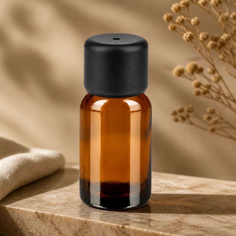 Amberkleurig glazen flesje van 10 ml met druppeldichte zwarte schroefdop voor nauwkeurig doseren