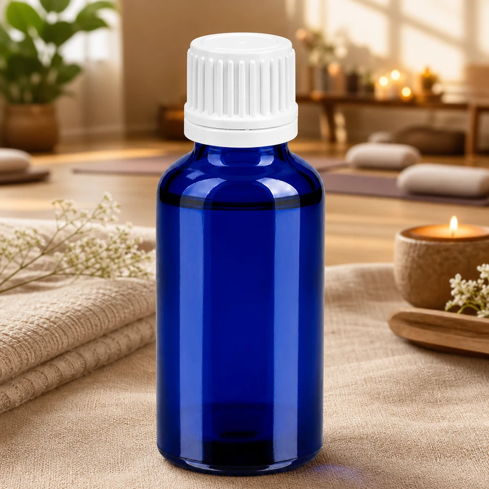 30ml fles 11mm SV wit OV BlueLine UT18/30 Robuuste blauwe glazen fles van 30 ml met witte dop voor natuurlijke cosmetica en verzorgingsproducten