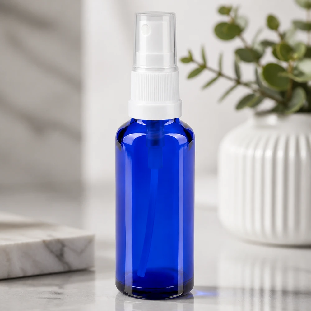 Compacte blauwe pompfles van UV-bestendig glas, 30 ml, apotheekkwaliteit