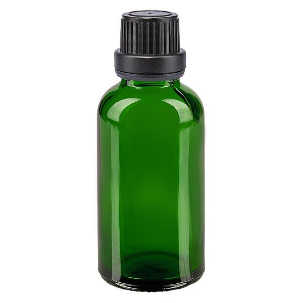 Groenen glazen flessen 30ml met zwart schroefsluiting dicht. VR Groenen glazen flessen 30ml met zwart schroefsluiting dicht. VR