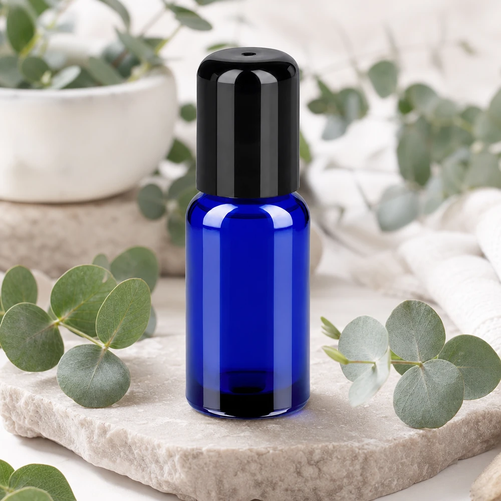Ergonomisch glazen flesje van 20 ml met roldeksel in elegant blauw en zwart design